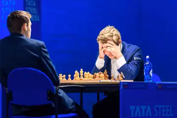 Chess World Champion Magnus Carlsen suffers upset at hands of prodigy Andrey Esipenko, 18