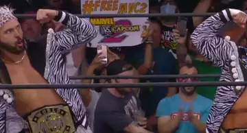 #FreeMvC2 sign spotted at All Elite Wrestling event